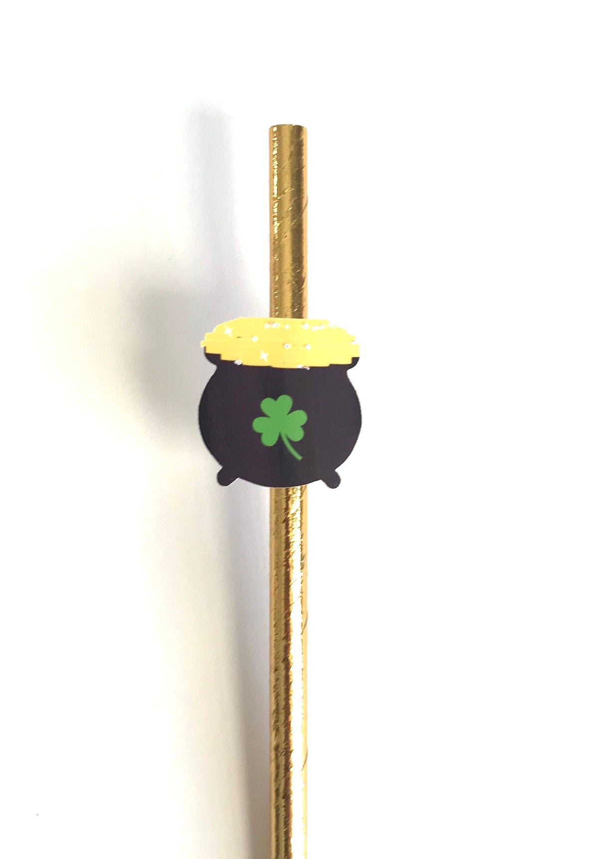 A gold foil paper straw with a paper pot-shaped topper in black, yellow, and green shamrock, shown on a plain white background.