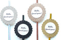 Four scalloped round paper straws with glittery edges and white centers printed with the text 'Hello, Gourd-geous!' in black script, shown on metallic sticks against a white background.